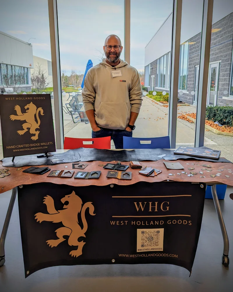 Sean Vandecamp of West Holland Goods at a vendor market table